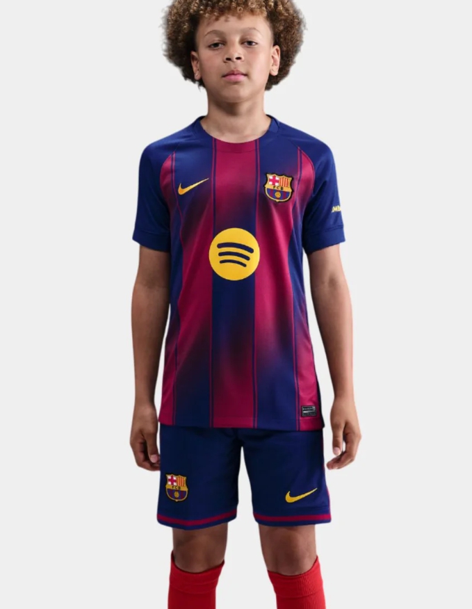 Bambino con maglia Barcellona Home 2025/26 Nike blu e granata per calcio giovanile